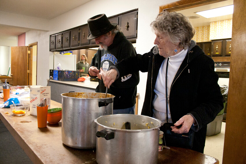 January 14, 2015 Genevieve stirs the spaghetti she prepared for the Anawim meal service in St. Johns