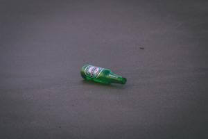 empty-heineken-bottle-on-ground